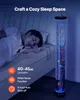 A child sleeping in bed next to a bubble lamp with fish. Produktbild-Vorschau