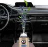 A car interior with a product emitting blueberries and leaves. Náhľad obrázku produktu