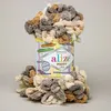 A can of Alize Puffy Color yarn with yarn loops spilling out and around it. Anteprima dell’immagine prodotto