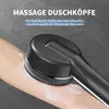 A hand is being massaged by a black shower head with soap suds. Produktbild-Vorschau