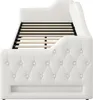 A side view of a white upholstered daybed with a slatted mattress support. Náhled obrázku produktu
