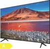 A television screen displaying a landscape scene, with an energy efficiency label in the bottom left corner. Produktbild-Vorschau