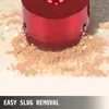 A close-up of a red diamond drill bit cutting into a surface, creating dust. Voir les images du produit