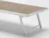 A close-up view of a section of a foldable lounge chair with a textured fabric seat and aluminum frame. Produktbild-Vorschau