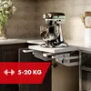 A kitchen mixer on a pull-out shelf inside a cabinet. Podgląd zdjęcia produktu