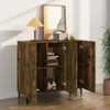 A wooden sideboard with its doors open, displaying shelves with books and decorative items. A lamp and a framed picture are on top of the sideboard. Anteprima dell’immagine prodotto