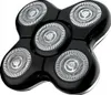 A close-up product shot of a black electric shaver head with multiple circular blades. Podgląd zdjęcia produktu