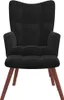 A black velvet armchair with wooden legs is shown against a white background. Produktbild-Vorschau