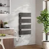 A modern bathroom or kitchen setting with a towel warmer, a plant, and kitchen cabinets. Produktbild-Vorschau