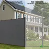 A privacy screen is shown attached to a chain-link fence, blocking the view of a house. The image is split, with one side showing the privacy screen in place and the other showing the fence without it. Produktbild-Vorschau