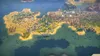 A sprawling city built on a peninsula, with a large body of water in the foreground and mountains in the background. Produktbild-Vorschau