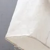 A close-up of a white fabric basket with water dripping from the bottom edge. Náhľad obrázku produktu