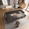 A modern living room with a large sectional sofa, dining area, and decorative elements. Produktbild-Vorschau