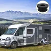 A motorhome parked in a scenic mountain landscape. Produktbild-Vorschau