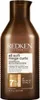 A brown bottle of Redken All Soft Mega Curls conditioner against a white background. Produktbild-Vorschau