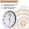 A close-up of a white analog wall clock with a white frame, set against a light gray background with abstract concentric circles. Text overlays describe the clock's features. Anteprima dell’immagine prodotto