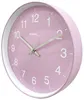 A close-up, angled view of a pink wall clock with white numbers and hands. Podgląd zdjęcia produktu