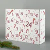 A white cardboard box with a Christmas-themed design, featuring candy canes and snowflakes, and numbered days from 1 to 24. Produktbild-Vorschau