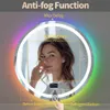 A woman is shown in front of a round LED mirror with colorful lighting around the edge. Text overlays describe the anti-fog function. Anteprima dell’immagine prodotto