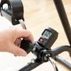 A close-up shot of a person's hand adjusting a part of a pedal system for arms and legs. Produktbild-Vorschau