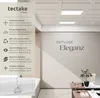 A modern office or living space with a ceiling light panel and text highlighting product features. Produktbild-Vorschau