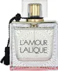 A perfume bottle with a decorative design and a tassel. Voir les images du produit