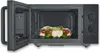 An open microwave with a glass dish containing food inside. Produktbild-Vorschau