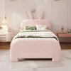 A child's bedroom with a pink bunny-eared bed. Anteprima dell’immagine prodotto