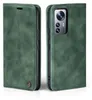 A green flip case for a smartphone is shown from two angles. Produktbild-Vorschau
