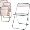 A set of four folding chairs stacked together on the left, and one chair unfolded on the right, all against a white background. Anteprima dell’immagine prodotto