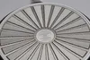 The underside of a frying pan with a radiating pattern and a central logo. Náhľad obrázku produktu