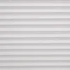 A close-up, full-frame shot of white pleated blinds. Produktbild-Vorschau