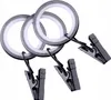 Three curtain rings with clips against a white background. Podgląd zdjęcia produktu