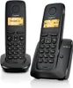 Two black Gigaset cordless phones are shown, one in a charging base, against a white background. Produktbild-Vorschau