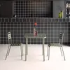 A small outdoor dining set with a table and two chairs. Produktbild-Vorschau