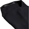 A close-up view of a black fabric product, likely apparel, showing textured details and a collar. Podgląd zdjęcia produktu