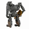 A toy model of a mech suit, viewed from the back and slightly to the side, against a white background. Podgląd zdjęcia produktu
