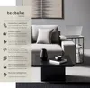 A modern living room scene with a sofa, coffee table, and a side table with a laptop. Produktbild-Vorschau