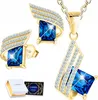 Ensemble collier en or avec cristal bleu et boucles Voir les images du produit 5