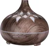 A close-up studio shot of a wooden-patterned aroma diffuser. Náhľad obrázku produktu