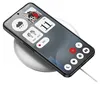 A smartphone is placed on a wireless charger, displaying various widgets on its screen. Produktbild-Vorschau