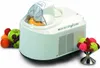 A white NEMOX Gelato Chef 2200 i-Green ice cream maker is shown on a white background, with a pile of fresh fruit to the left and a bowl of colorful ice cream to the right. Voir les images du produit