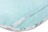 A close-up view of a pillow with a zipper partially open, revealing the inside. Voir les images du produit