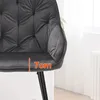 A close-up of a gray velvet chair seat with a measurement indicator. Produktbild-Vorschau