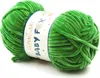 A ball of green yarn with a label. Produktbild-Vorschau