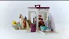 A toy playset depicting a pet grooming salon with various animal figures and accessories. Produktbild-Vorschau