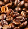A close-up view of roasted coffee beans, with some steam rising. Voir les images du produit