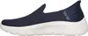 Side view of a navy blue Skechers Slip-Ins shoe with a white sole. Produktbild-Vorschau