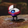 A small, red and white droid with blue lights sits on a rocky surface. Anteprima dell’immagine prodotto