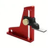 A red depth gauge with black and gold accents, shown against a white background. Náhled obrázku produktu